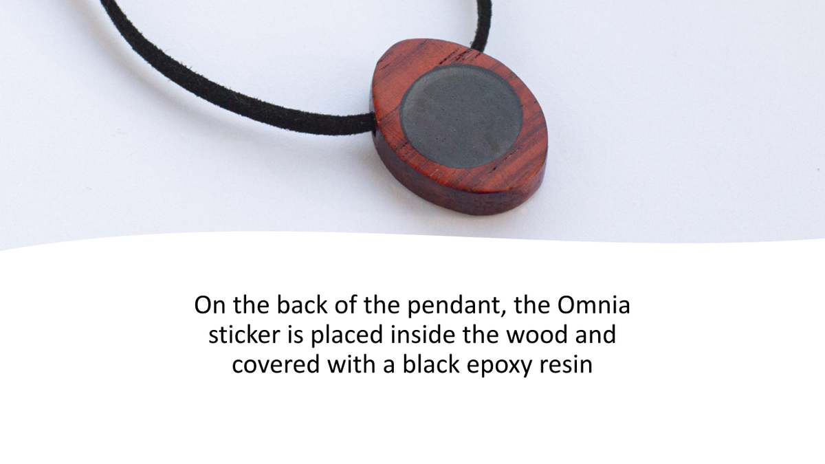 Padauk Deca Omnia Radiation Balancer Pendant close up text