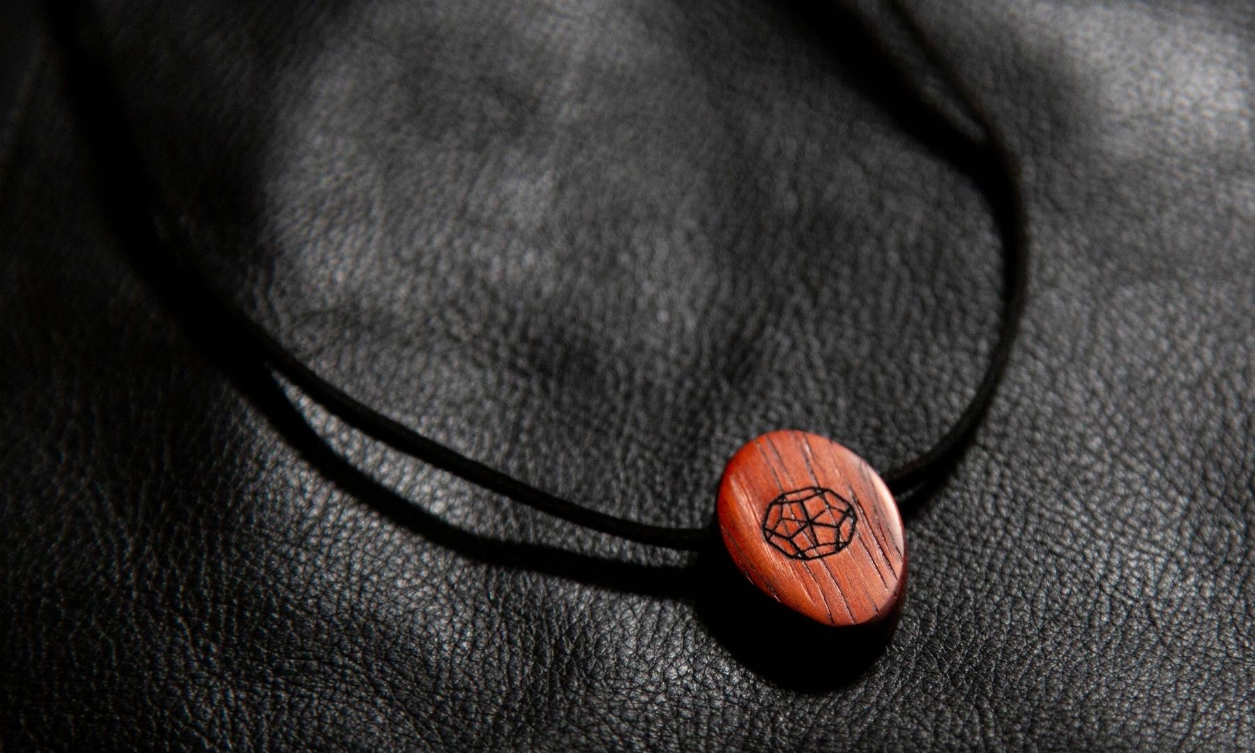 Padauk Deca Omnia Radiation Balancer Pendant on grey